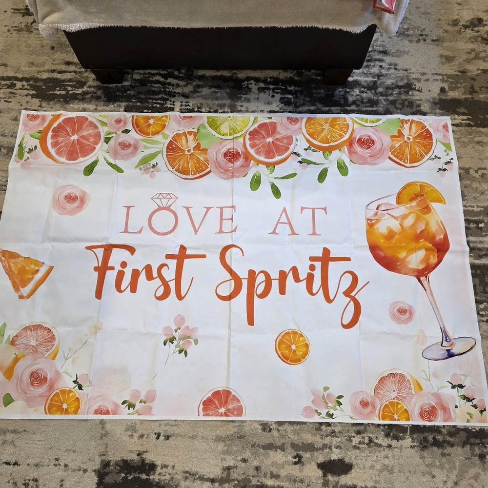 'Love at First Spritz' shower decor